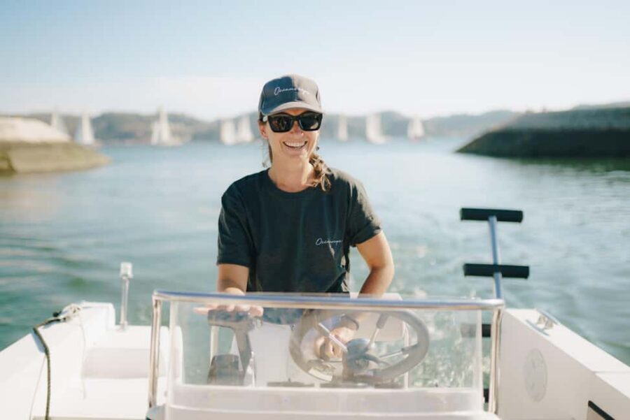 Lisbon Sunset Boat Tour with local Snacks & Drinks - The guide duo: stories that land while you’re moving