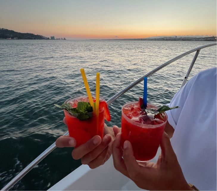 Lisbon: Sunset Boat Tour with Wine - Commerce Square and Alfama: city life at water level
