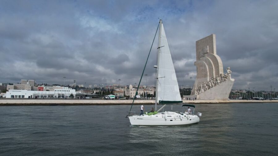 Lisbon: Sunset Cruise on The Tagus River with Welcome Drink - The boat setup: small group, welcome drink, and relaxed pace