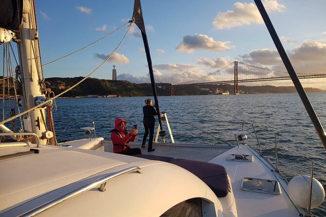 Lisbon: Sunset Cruise With Drinks on Spacious Yacht - Setting Sail at Doca de Santo Amaro and the 25 de Abril Bridge
