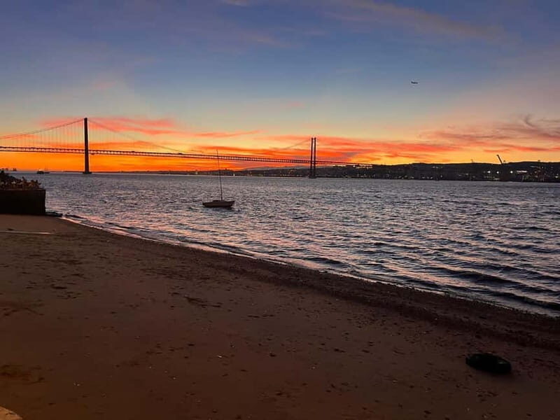 Lisbon: Sunset Sailing with Local Wine & Stunning Views - Almada and Cristo Rei: looking back toward the view many miss