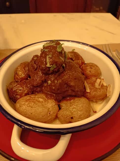 Lisbon: Traditional Walking Food Tour - Praça Luís de Camões street food: built for wandering appetite