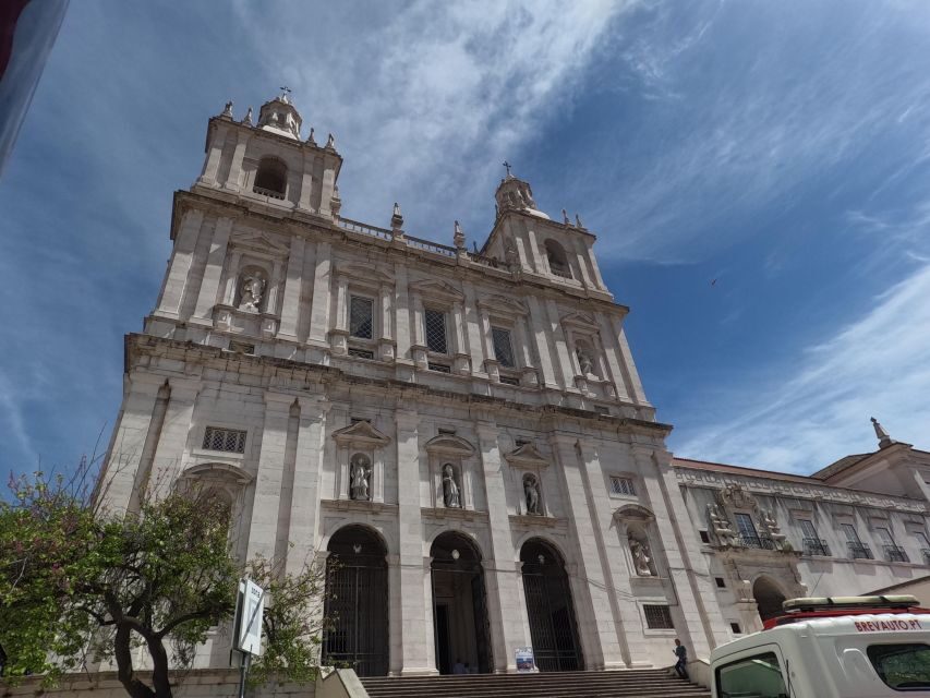 Lisbon:Private guided historical sightseeing Tour by TUK-TUK - Chiado to Parque Eduardo VII: Santa Justa, Parliament, and Basilica da Estrela