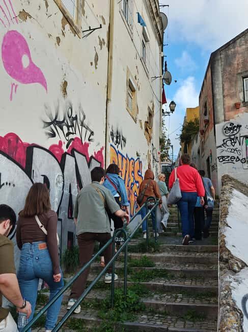 Multicultural Lisbon: Stories, Art, Music, Flavor & Secrets - Graça climb and sunset views: why 200 steps is worth it