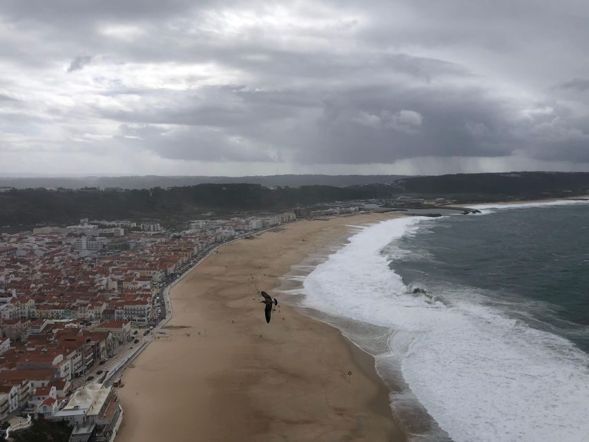 Nazaré: Big Wave Capital & Medieval Óbidos tour from Lisbon - Big Waves Here: How to Think About Nazaré Surf Without the Myth