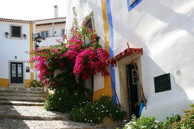 Nazare,Obidos, and Batalha Monastery Private Tour - Óbidos: medieval streets, ginjinha in a chocolate cup, and castle views