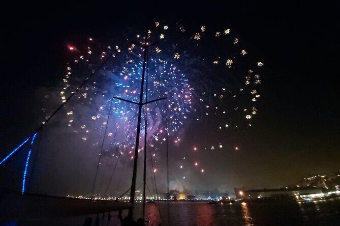Passing the Year in a Boat with Champagne and Fireworks - What You Get Aboard: Sparkling Vinho Verde, Blankets, and a Bluetooth Party
