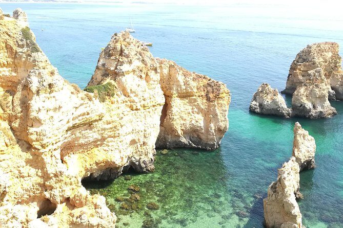 Private Algarve: Benagil Caves, Lagos Cliffs & Hidden Beaches - Praia dos Estudantes: Cliff Tunnel Access and a Photogenic Roman-Style Bridge