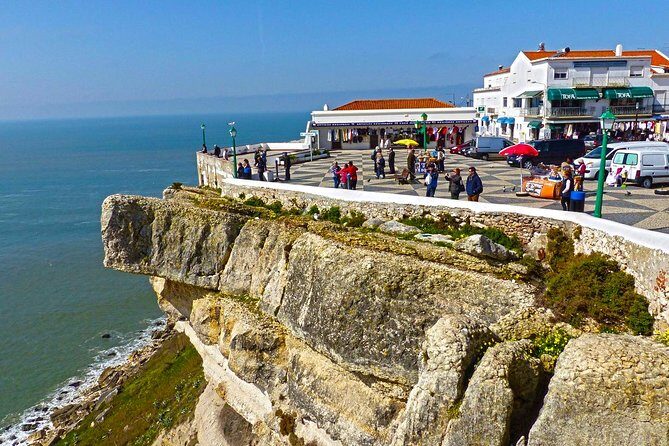 Private day tour Fatima Batalha Nazare Obidos from Lisbon - Nazare’s Praia Norte: giant waves, beach time, and quick photo stops