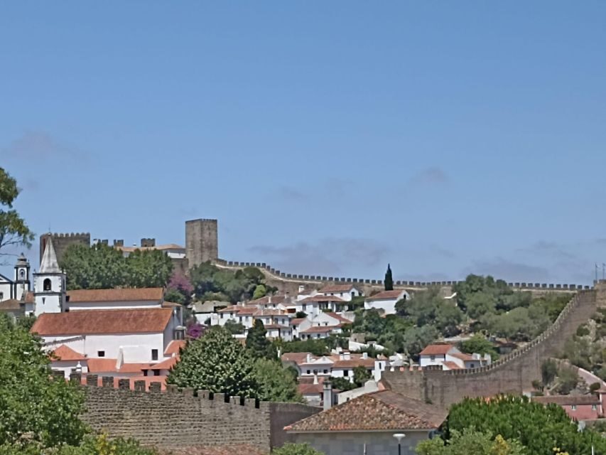 Private Fátima Tour: Fátima- Nazaré- Óbidos - Óbidos inside the castle walls: medieval lanes, shopping pace, and ginginha in chocolate