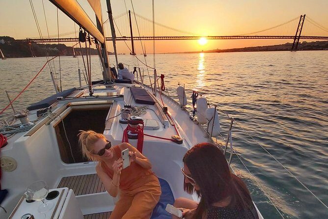 Private Golden Hour Boat Tour - Best Exclusive Sunset Sailing - Passing the 25th April Bridge and Christ the King on your way along the Tagus