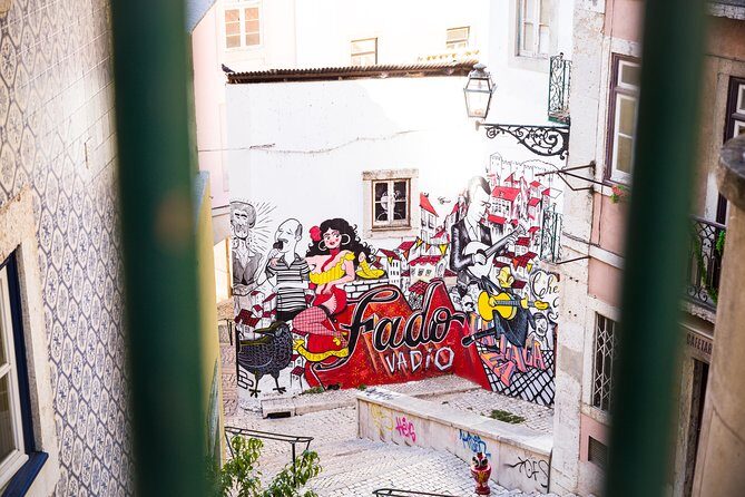 Private Tour: Lisbon Sunset Walking Tour with Fado Show and Dinner - Mouraria’s alleys and Berço do Fado: ginjinha with actual context