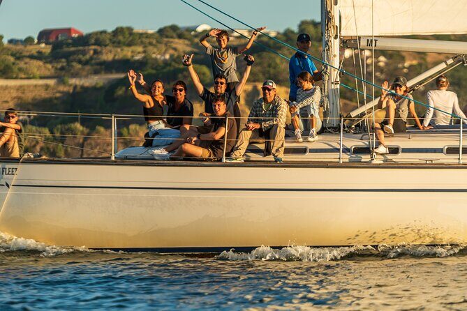 Romantic Private Sailboat in Lisbon for couples - The 25 de Abril Bridge pass: instant Lisbon scale from the river