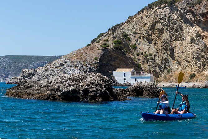 Sesimbra : Guided Kayak Tour in Arrábida Natural Park & Caves - Paddling Past Sesimbra: Caves, Cliffs, and Ocean-Condition Work