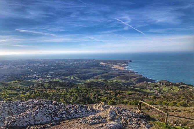 Sintra Cascais (Wine and Tapas) 4X4 Land Rover Panoramic Private Tour - Sintra National Palace: iconic chimneys and mixed architectural styles