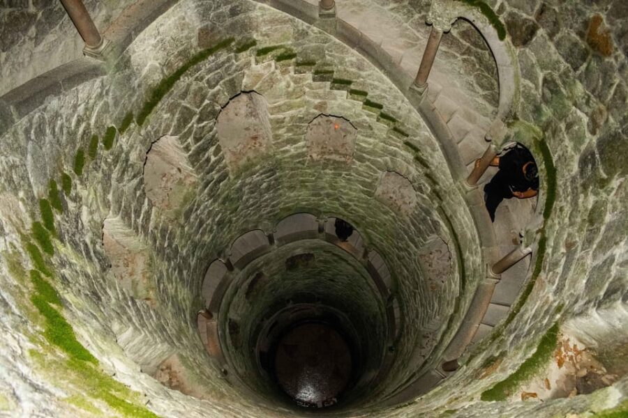 Sintra: Pena Palace, National Palace, and Regaleira Tour - Quinta da Regaleira: Secret Tunnels, Garden Symbolism, and the Initiation Well