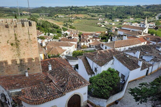 Small group tour to Nazaré and Obidos from Lisbon - Óbidos: Medieval Streets, Ramparts, and Ginjinha in a Chocolate Cup