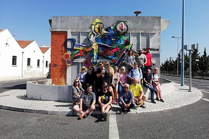 The Real Lisbon Street Art Private Guided Tour by Minivan - Small-group energy, multilingual guides, and real-life logistics that matter