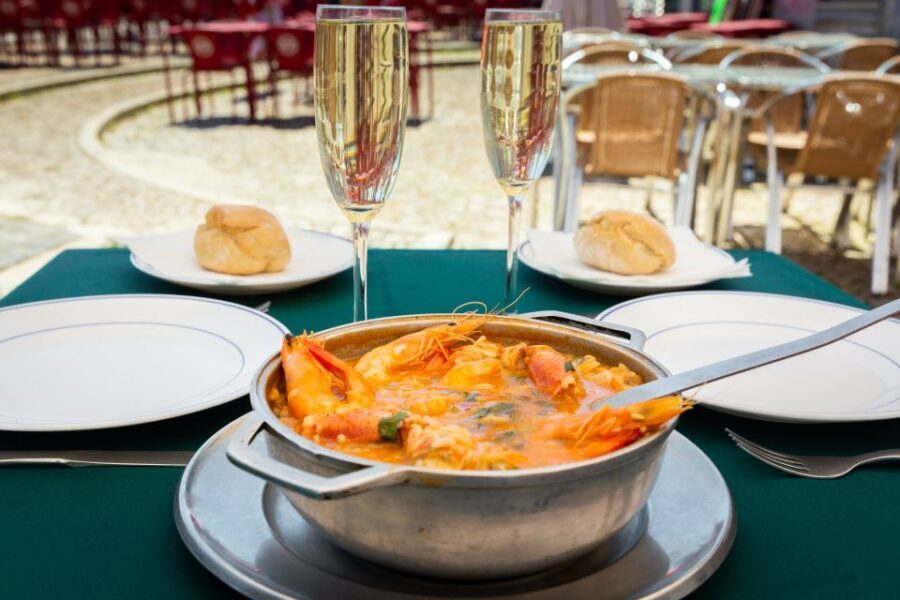 Total Lisbon Experience Walking Tour with Seafood Lunch - Chiado and the Carmo Convent viewpoint: beer with city-scale views