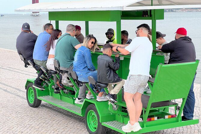Tropical BeerBike in Tejo River Lisbon - Where You Meet by MAAT and the 25 de Abril Bridge